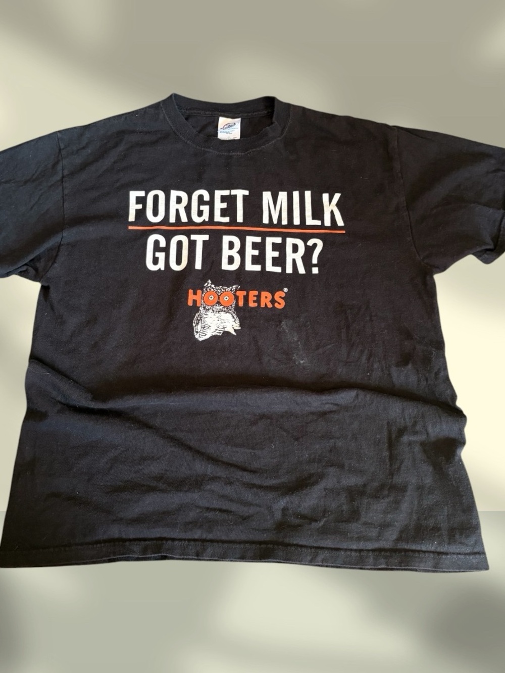 Hooters Black Tee with White & Orange Graphic - "Forget Milk Got Beer?"